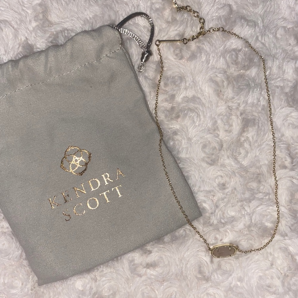 Rose quartz and gold Kendra Scott necklace